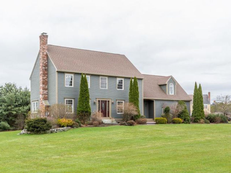 Freshly painted home exterior in a neighborhood setting